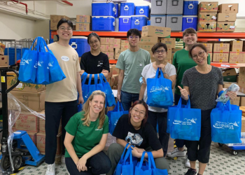 Pack, sort and load food for vulnerable communities